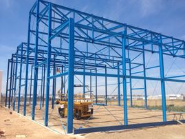 Estudio de Arquitectura Félix Cuadrado nave industrial vigas azules