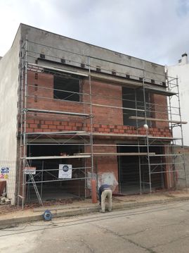 Estudio de Arquitectura Félix Cuadrado casa fachada en construccion